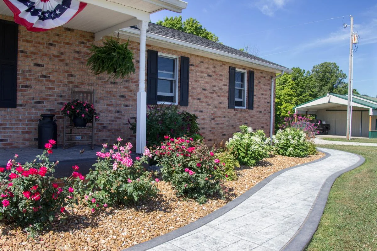 Completed walkway and planting project by Dave's Landscaping